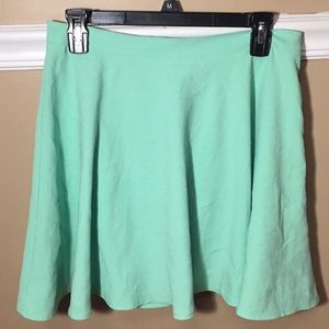 Cyan (blue/green colored) skirt
